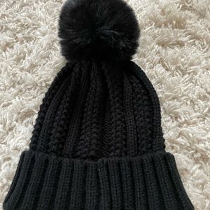 Vince Camuto , black wool hat with pom-pom